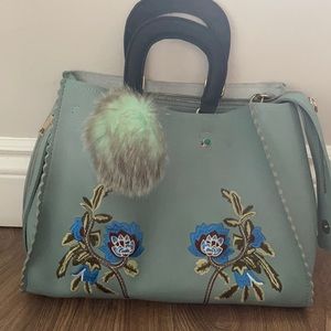 Vintage blue bag with embroidery detail